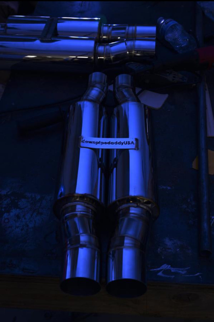 Our mufflers, illuminated by the blinding light from a TIG welder.